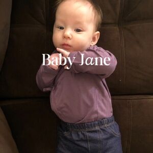 Kate Quinn Organic Cotton Purple Baby Onesie